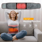 Woman using Best Heated Waist Belt for Back Pain Relief with red light display on a couch, indicating heating function.