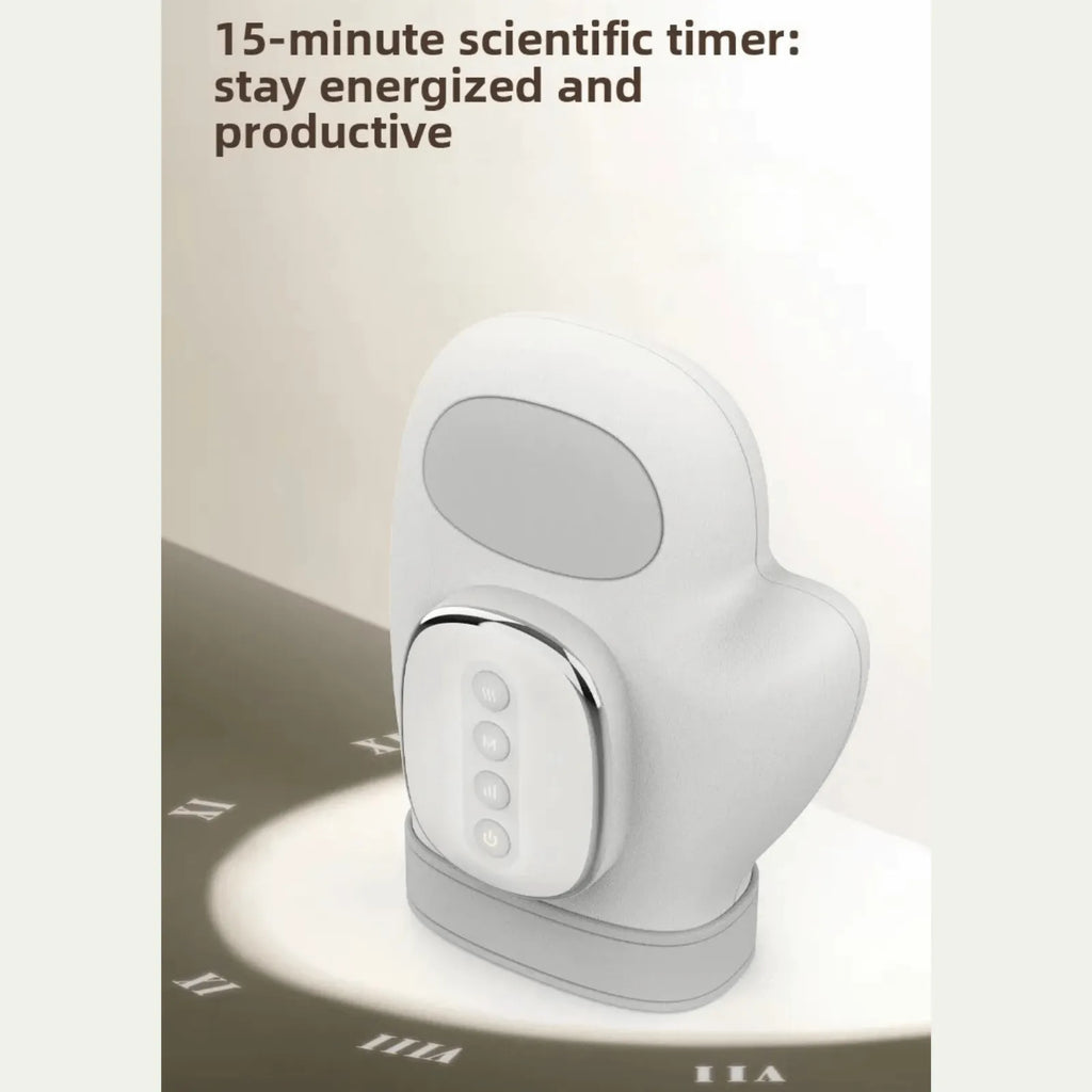 Luliqua HandRelief Pro 15-minute scientific timer for energized productivity - white hand massager with gray oval display window on top, white rounded control panel with chrome border showing 4 circular buttons, placed on white hand-shaped charging mat with gray base, natural lighting casting shadows, text reads 15-minute scientific timer stay energized and productive