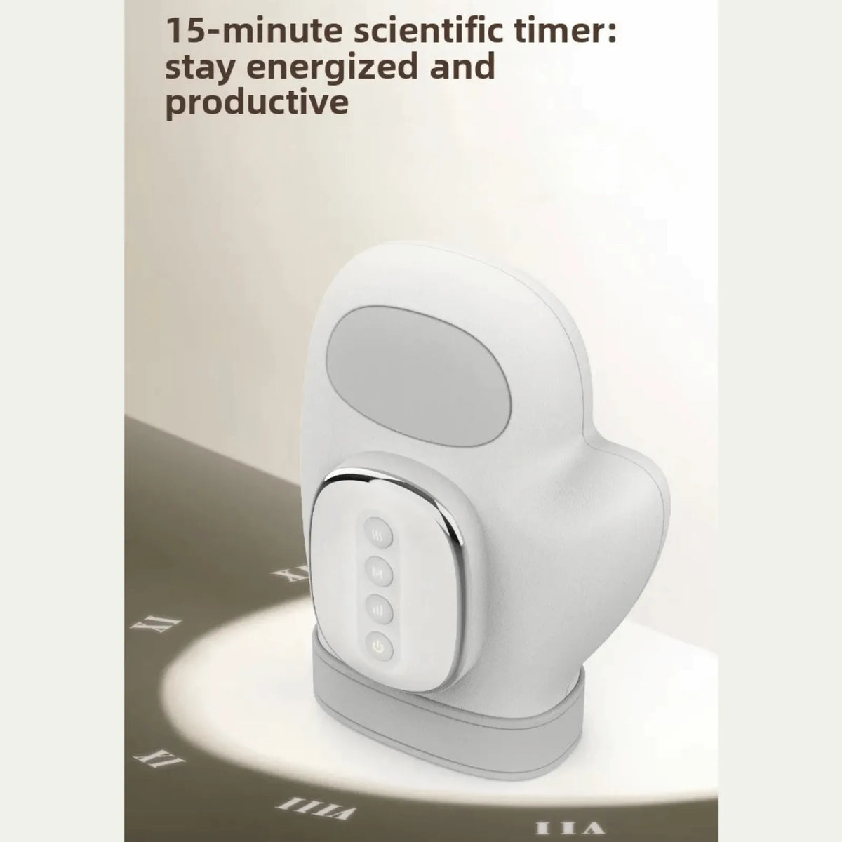 Luliqua HandRelief Pro 15-minute scientific timer for energized productivity - white hand massager with gray oval display window on top, white rounded control panel with chrome border showing 4 circular buttons, placed on white hand-shaped charging mat with gray base, natural lighting casting shadows, text reads 15-minute scientific timer stay energized and productive